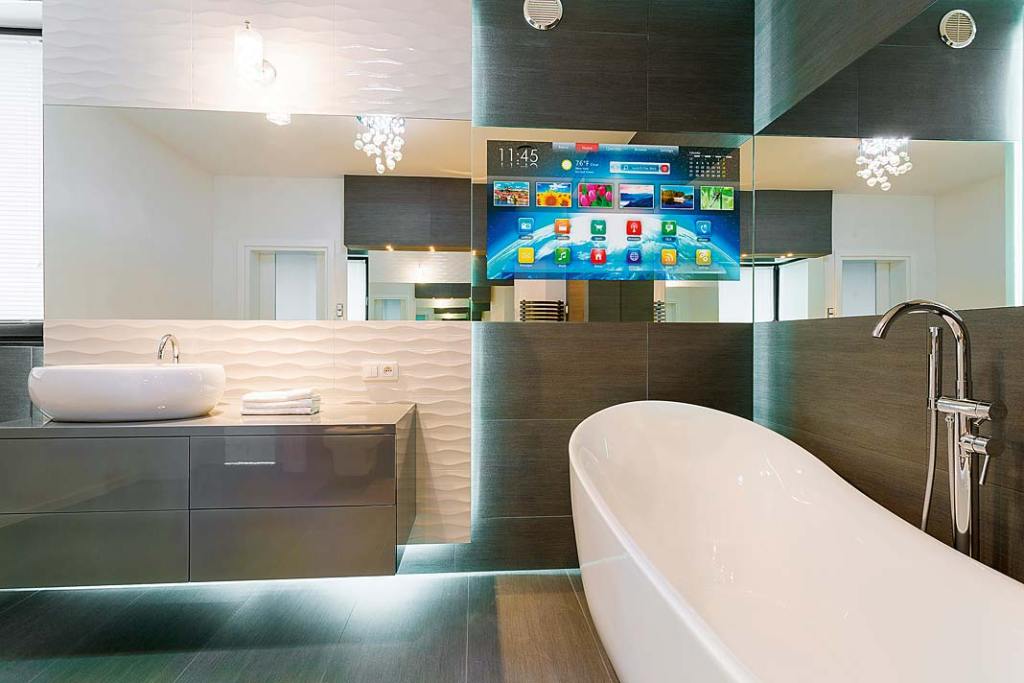 Lustrzane szkło Pilkington MirroView NSG Group może pełnić funkcję interaktywnego ekranu w łazience