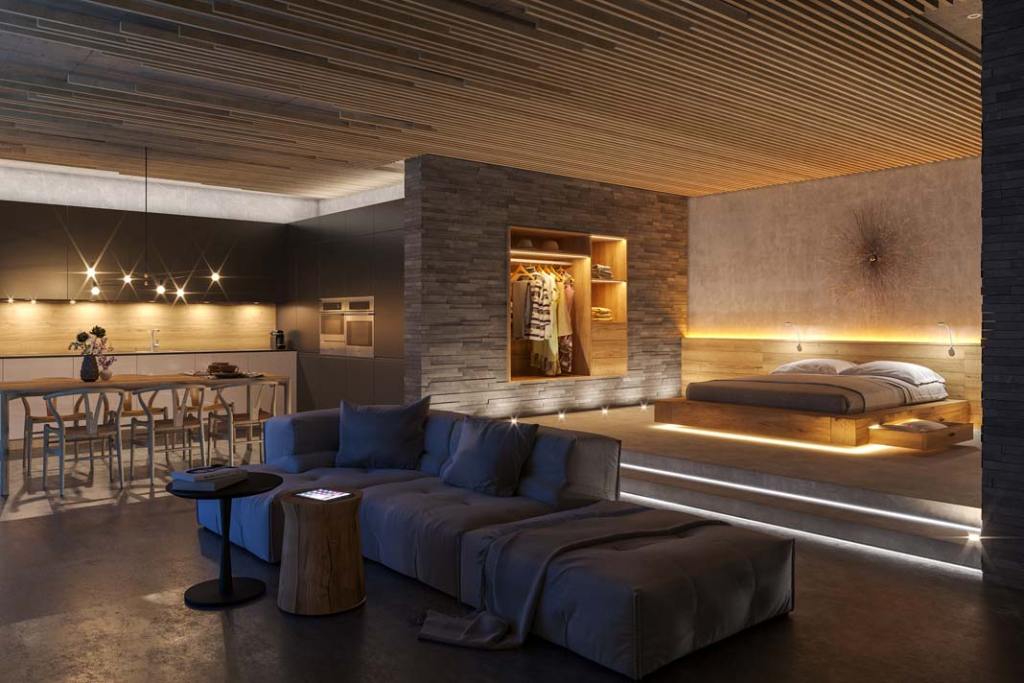 Pierwszoplanową gwiazdą tej aranżacji jest część sypialniana z garderobą we wnęce. Ulokowano ją na podeście, jak na scenie, i wyeksponowano przy użyciu systemu oświetlenia meblowego LOOX LED od Häfele.