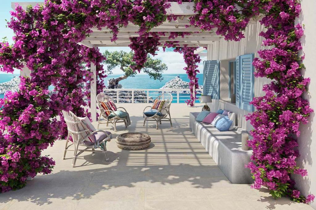 Casalgrande-Padana - taras z ażurową pergolą porośnieta budenwillą_ pomysł na zewnętrzne osłony przeciwsłoneczne